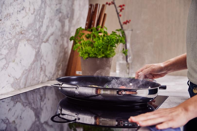Poêle à poisson revêtue